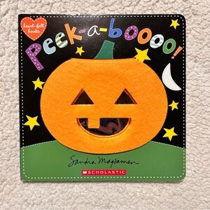 Scholastic Peek-a-boooo! Children’s Board Book by Sandra Magsaman